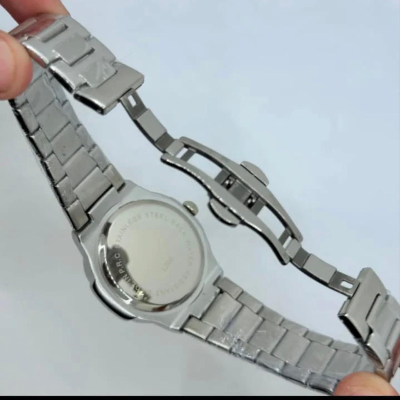 E.SIGNATURE PATEK PHILIPPE NAUTILS